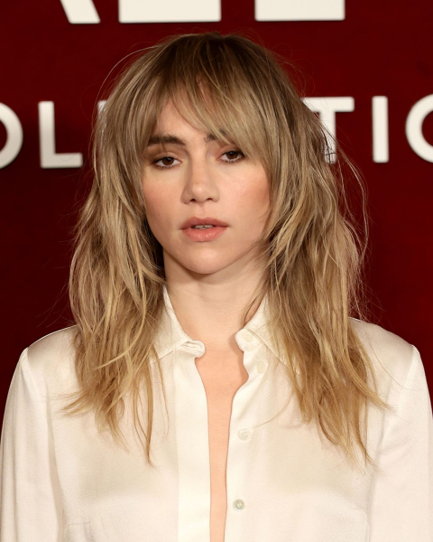 Suki Waterhouse in a white button down shirt