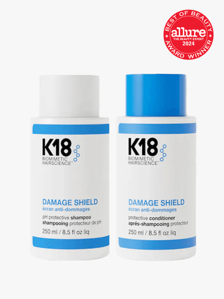 K18 Damage Shield pH Protective Shampoo and Conditioner in branded components on a light gray background with best of beauty 2024 seal in the top right corner